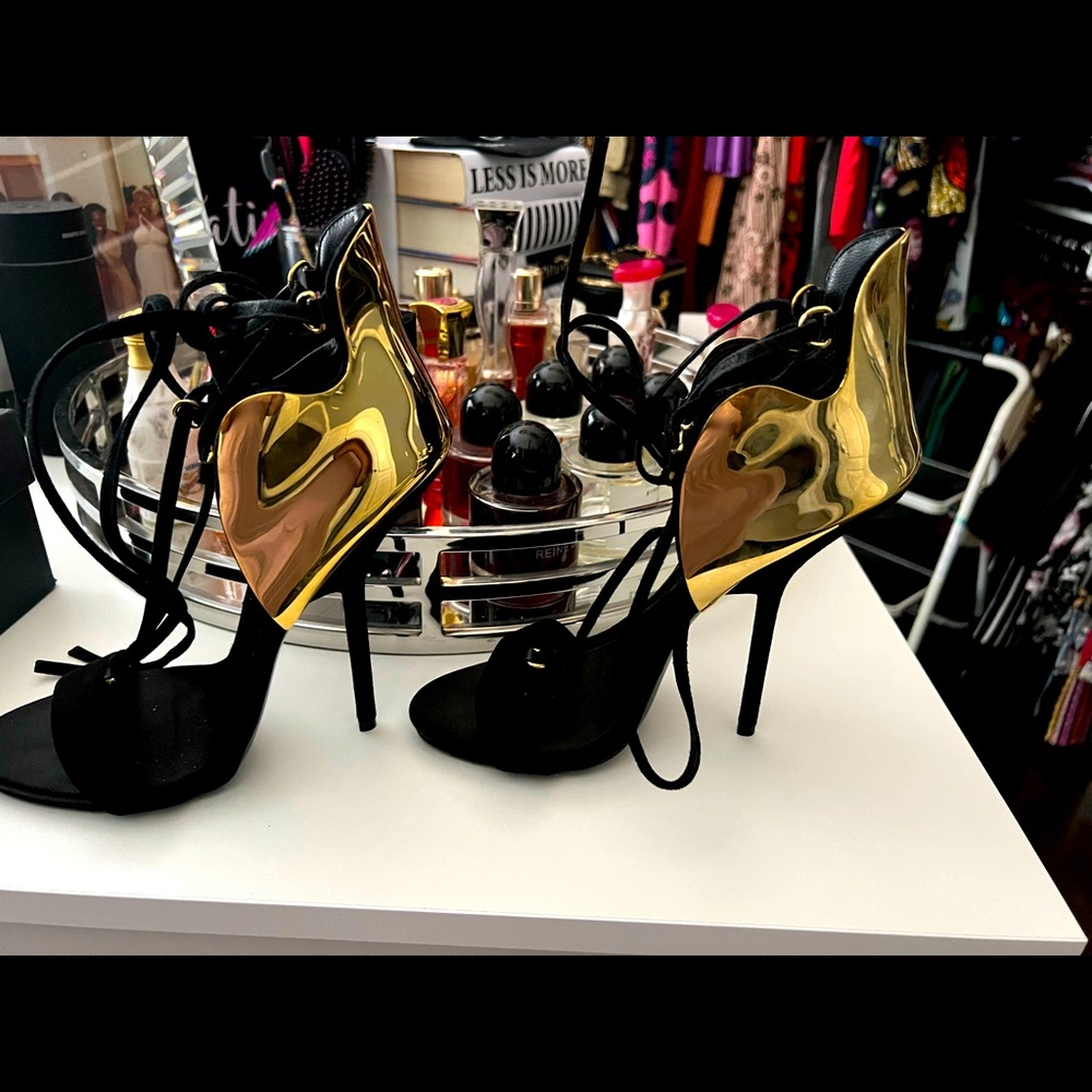 Black and Gold Gently worn . (Gold is metal)